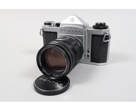 An Asahi Pentax AS SLR Camera, shutter working, body G, with Takumar 105mm f/2.8 lens, barrel G, elements G, with caps