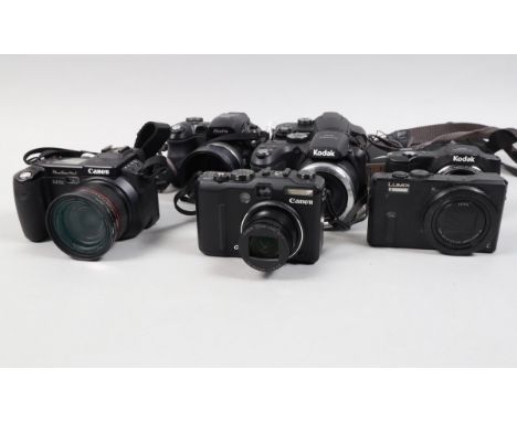 Compact Digital Cameras, including a Canon G9, powers up, shutter fires, flash working, otherwise untested, body G-VG, auto f