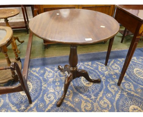 Circular mahogany occasional table on tripod legs 