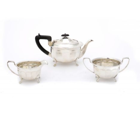 A GEORGE VI SILVER THREE PIECE PANELLED OVAL TEA SERVICE  teapot 13cm h, by Viners Ltd, Sheffield 1946, 28ozs gross ++The lot