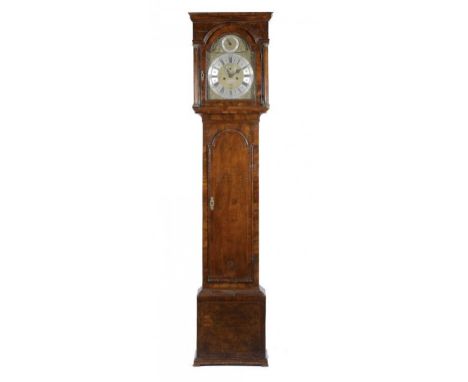 A WALNUT AND FEATHERBANDED EIGHT DAY LONGCASE CLOCK, 18TH C the brass breakarched dial engraved on a silvered tablet to the m