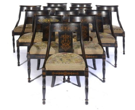 A SET OF TWELVE REGENCY BLACK AND GILT JAPANNED  CHAIRS, C1805 the padded seats covered in floral woolwork or other fabric, 8