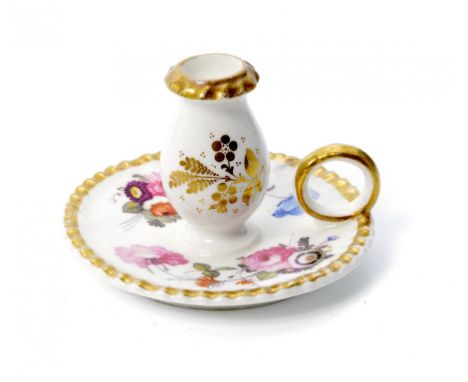 AN ENGLISH PORCELAIN TAPERSTICK, POSSIBLY COALPORT, C1820  painted with flower sprays, 5cm h ++In fine condition with light w