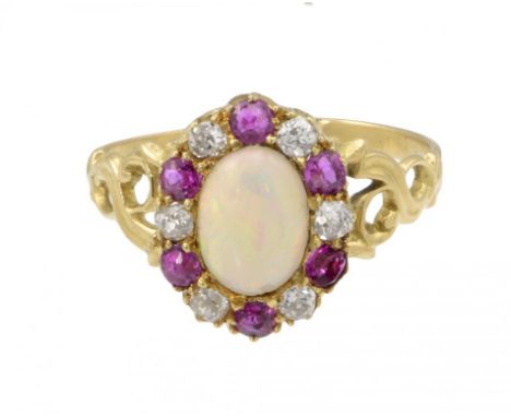 A DIAMOND, RUBY AND OPAL CLUSTER RING, EARLY 20TH C  in gold with openwork shoulders, size O, 2.7g gross ++In fine condition 