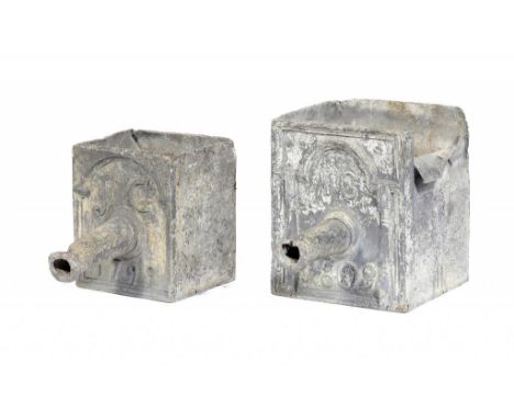 TWO GEORGE III LEAD PUMP HOPPERS, DATED 1799 AND 1809 with canon barrel spout and initials in architectural surround, 30 & 36