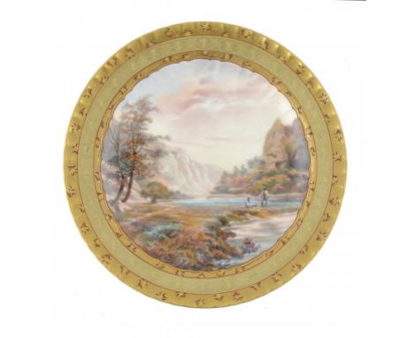 A ROYAL CROWN DERBY PLATE, 1890 of Harrow shape, painted by E Trowell with a Derbyshire scene in raised gilt border, 22cm dia