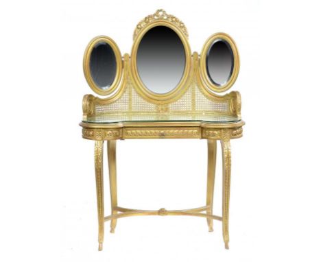 A FRENCH GILTWOOD AND CANED KIDNEY SHAPED DRESSING TABLE WITH TRIPLE MIRROR, C1930  142cm h, 100cm w ++In good condition 