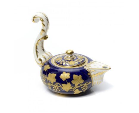A SAMPSON HANCOCK ROMAN OIL LAMP AND COVER, EARLY 20TH C painted with an oval panel of flowers, the reverse with raised gilt 