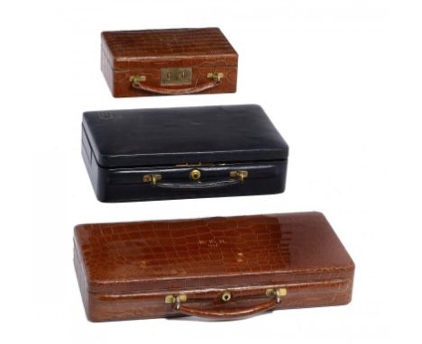 A FINE SWAINE & ADENEY   CROCODILE HIDE JEWEL CASE, DATED 1936  the lid with gilt tooled initials DKH and date, the brown vel