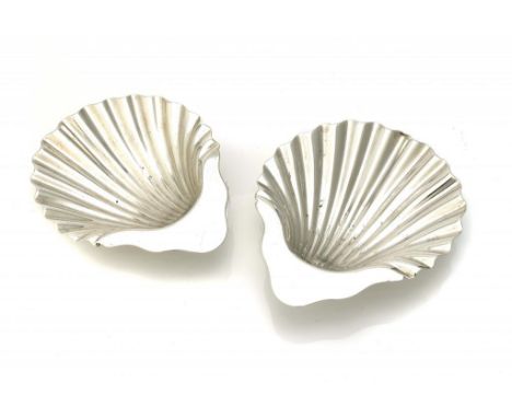 A PAIR OF VICTORIAN SILVER BUTTER SHELLS  on whelk shell feet, 12cm h, by Francis Higgins & Son, London 1885, 5ozs ++Slight w