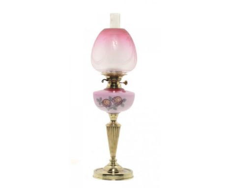 A VICTORIAN BRASS OIL LAMP, C1890  the pink shaded glass fount enamelled with peonies, Sunlight & Safety Light Co Ltd brass b