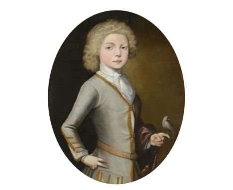 ENGLISH SCHOOL, 18TH CENTURY PORTRAIT OF A BOY  half length in a pale grey coat, a bird perched on the index figure of his le