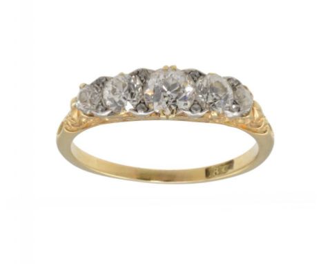 A DIAMOND RING in gold, gross weight 3.7g, size R ++Diamonds generally clean and with good spread, slight wear only to shank 