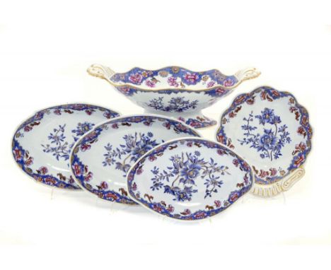 A SPODE BLUE PRINTED EARTHENWARE SHELL HANDLED COMPORT, ONE AND A PAIR OF DESSERT DISHES AND A BOAT SHAPED STAND, C1820  the 