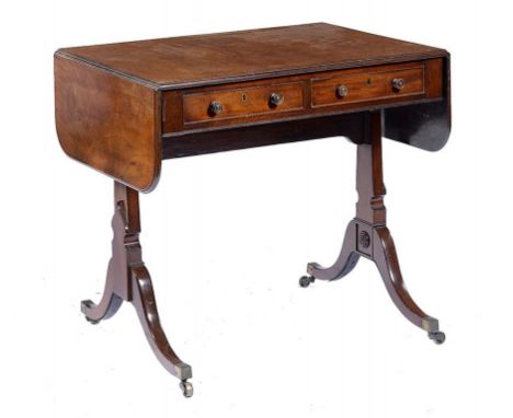 A GEORGE IV MAHOGANY SOFA TABLE, C1830 fitted with drawers and opposing blind drawers, brass castors, 72cm h; 58 x 124cm ++Me