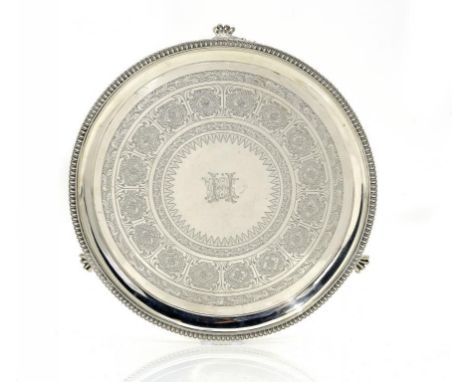 A VICTORIAN SILVER SALVER  on three paw feet, 31cm diam, by Elkington & Co, London 1874, 29ozs ++In fine condition with a few
