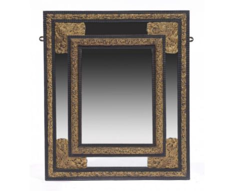 A FLEMISH EMBOSSED BRASS MOUNTED AND EBONISED RIPPLE MOULDED MIRROR, 19TH C 84 x 72cm ++Dusty but complete and requiring only
