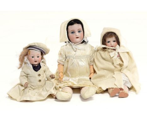 THREE SIMON & HALBIG, HEUBACH AND ARMAND MARSEILLE BISQUE HEADED CHARACTER DOLLS, LATE 19TH/EARLY 20TH C with composition bod