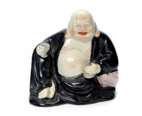 A STAFFORDSHIRE PEARLWARE FIGURE OF HOTEI, C1820 holding a bottle and glass and clad in a black robe, 11cm  h, 47 in sepia ++