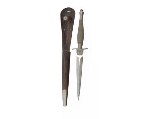 A BRITISH COMMANDOS SECOND PATTERN FAIRBAIRN-SYKES FIGHTING KNIFE AND LEATHER SHEATH by Wilkinson Sword Co Ltd, London, knife