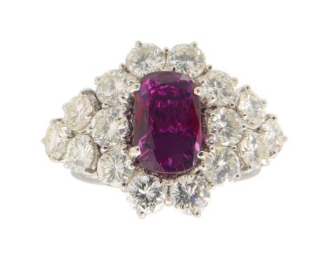A RUBY AND DIAMOND RING, C1980,  in white gold, maker's mark and 18CT, 17 x 23mm approx, 6.2g gross, size L ++In excellent se