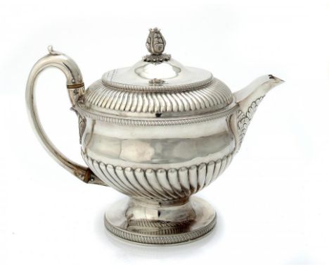 A GEORGE III SILVER SPIRALLY LOBED TEAPOT  with integral hinge to the domed lid, 16.5cm h, by Peter and William Bateman, Lond