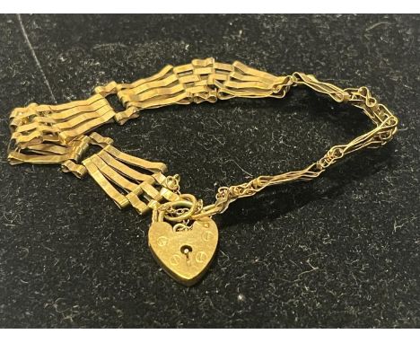 A 9ct gold gate bracelet 9.44g 