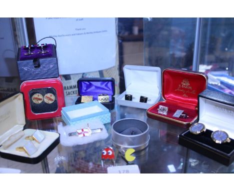 A selection of assorted novelty cufflinks 