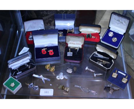 A job lot of assorted tie pins, tie clips and cufflinks 