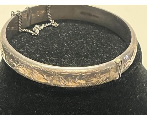 A hallmarked silver bangle. 13.54 grams &amp; 6cm internal diameter 