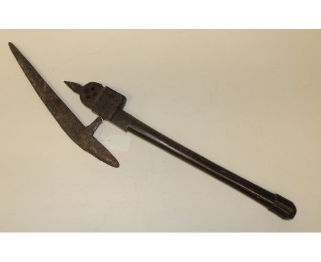 An African axe with hardwood handle and long hand forged metal blade, overall length 62cms
