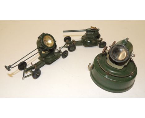 BRITAINS - a field gun on chassis with extending stabilisers together with a searchlight on chassis with stabilisers and toge