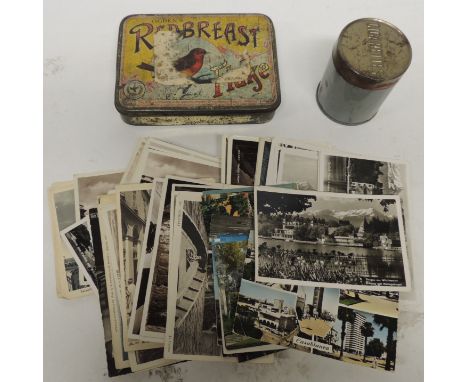 An Ogdens Redbreast Flake (tobacco) tin with coloured litho decoration; a metal cigarette canister and cover and a small quan