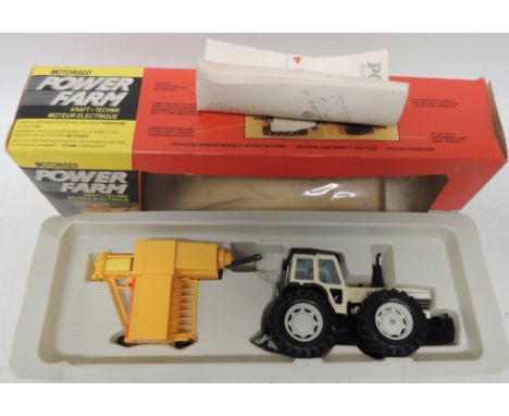 BRITAINS - 9386 Power Farm battery operated County Tractor and New Holland Baler in original box and with instructions ++trac
