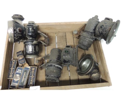 A Powell & Hanmer Ltd New Sultan acetylene lamp together with other lamps and 5 Champion spark plugs in original boxes