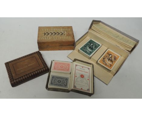 An Edwardian De La Rue "Combined Marker", the leather covered folding marker board with Cribbage marker, Bezique marker and o