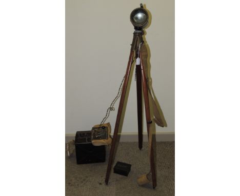A WWII Indian Army signalling lamp on wood tripod base together with morse code key in metal box with webbing straps and with