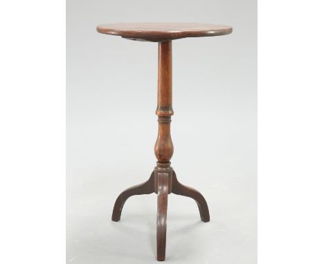 AN EARLY 19TH CENTURY MAHOGANY TRIPOD TABLE, the circular top raised on a baluster stem continuing to downswept legs. 73cm hi