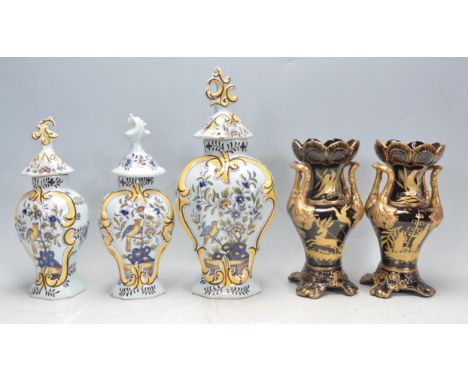 A group of three lathe 19th century Victorian ceramic porcelain Italian Majolica style vases. The vases of baluster form with