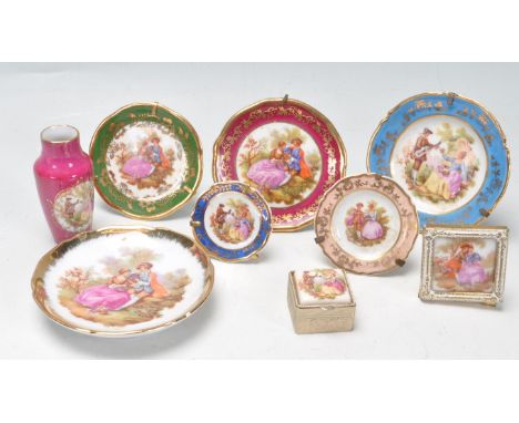 A collection of 20th century French Limoges ceramic cabinet ware to include a vast variety of miniature plates, vase, trinket