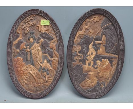 A pair of mid century Bretby - England ceramic wall plaques in the Japanese oriental manner. Model No's 1509 &amp; 1510, each