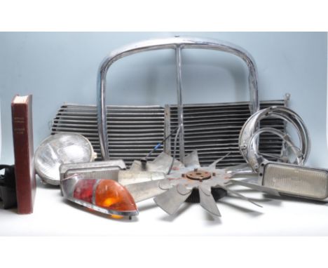 A collection of vintage retro 20th century automobile car spares / accessories and car part to include chrome front grill, ch