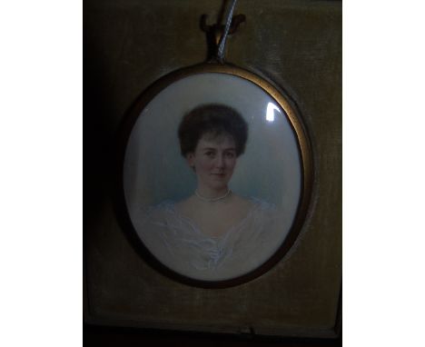 An Oval Miniature Portrait - Helen Wright (nee Kerr) contained in a leather folding case. 8cm x 6.5cm.