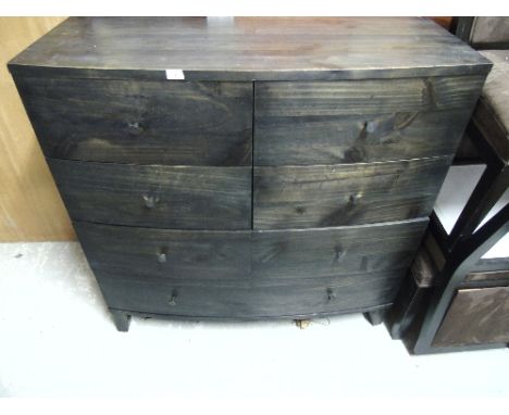 A Stained Pine Bow-Fronted Modern Chest of Drawers.