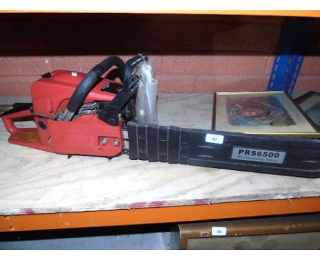 A German Petrol Chainsaw, with instructions.