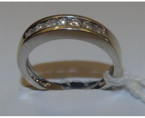 A White Gold Diamond Eternity Ring.