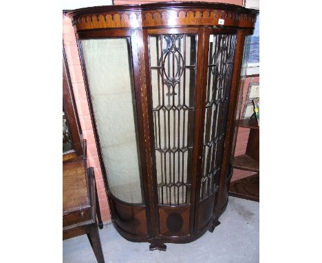 A Wonderful Edwardian Mahogany Double Bow-Fronted Display Cabinet with profusely glazed front (lacking shelves).