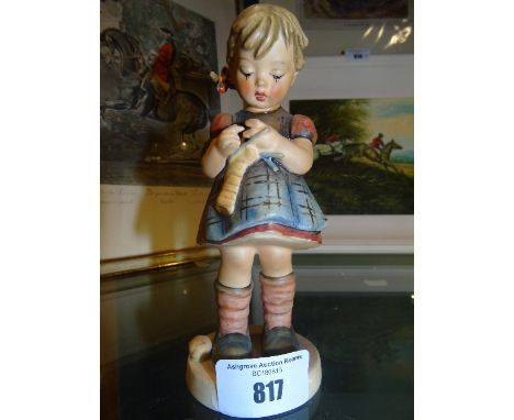 A Goebel Figure of a Young Girl.