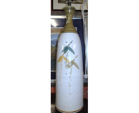 A Large Studio Pottery Floor Standing Lamp, of bottle shape form, with drawn neck and hand painted stylised floral detail.