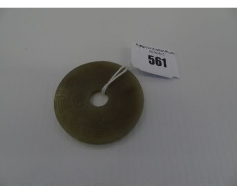A Carved Jade Pendant.